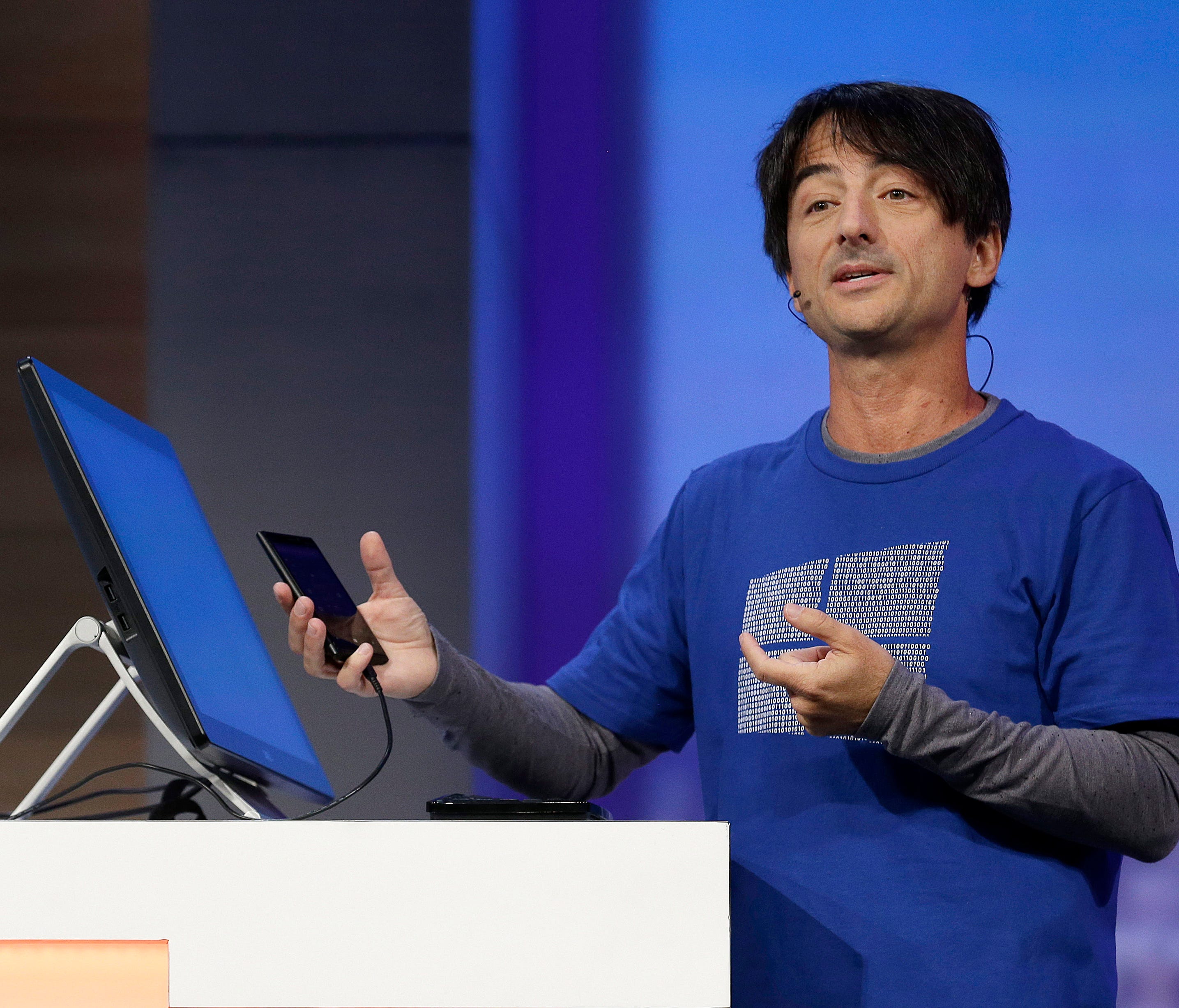 Joe Belfiore, Microsoft Corporate Vice President of Operating Systems Group, demonstrates Continuum for phones at the Microsoft Build conference in San Francisco, Wednesday, April 29, 2015.