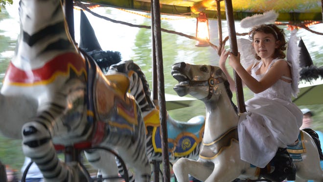 Cheyenne Pellerin, 7, rides the "Carou-Spell" carousel during the annual ZooBoo at the Hattiesburg Zoo Oct. 23. ZooBoo is open 5:30-8pm from October 23-31, admission is $10 per person and includes unlimited train rides on the ÒSpooktackular Express." Tickets to ZooBoo are available for advance purchase at HattiesburgZoo.com. Tickets will also be available at the Zoo each night of ZooBoo beginning at 5:30pm. For more information, visit HattiesburgZoo.com. 