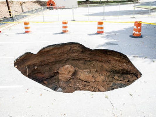 Huge Sinkhole Emerges On County Owned Site
