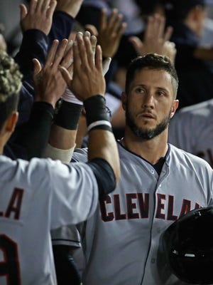 Yan Gomes had plenty of hands to slap after hitting a three-run homer Tuesday - the Indians are playing with a 36-man active roster.