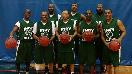 The Indy All-Stars from left to right, front row: Lonnie Eaton, Kerry Robinson, Sam Ward, CJ Jordan, Jerome Bridges. Back row, left to right: James Adams, Randall Diggins and Thomas Taylor.