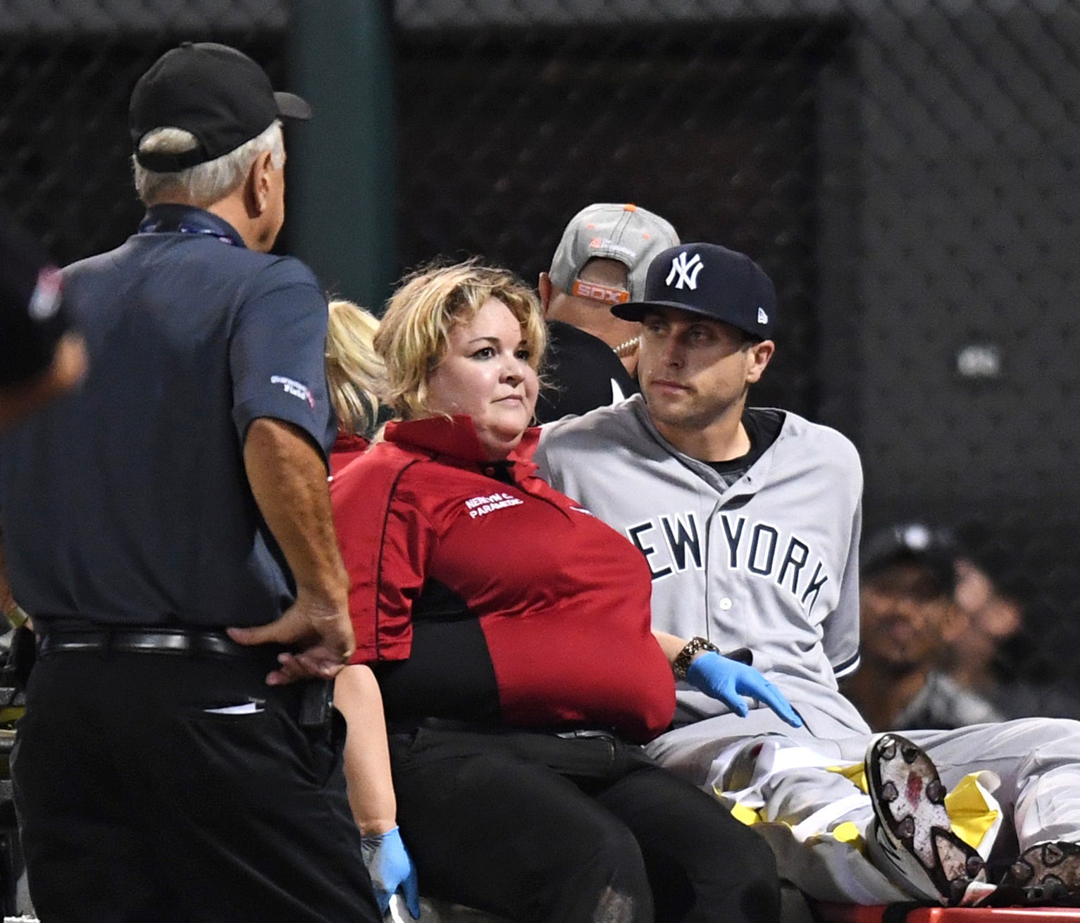 Former New York Yankees outfielder Dustin Fowler is taken off the field after colliding with the wall in the first inning against the Chicago White Sox at Guaranteed Rate Field on June 29.