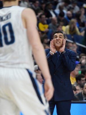 Villanova Wildcats head coach Jay Wright instructs his team in the first half against the Wisconsin Badgers during the second round of the 2017 NCAA Tournament at KeyBank Center.