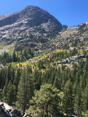 The views make the ascent worth the effort. Check out the stripes of color on the hillside.
