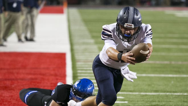 Perry quarterback Brock Purdy scores a touchdown against Chandler during the first quarter of the 6A high school football state championship game at Arizona Stadium in Tucson on Saturday, December 2, 2017.