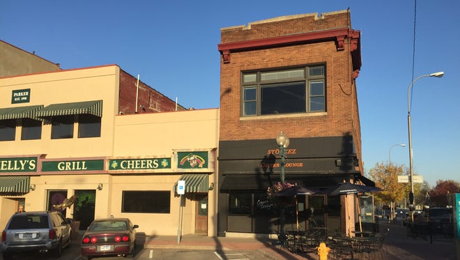 The downtown building that includes Copper Lounge has been sold to an investment group.