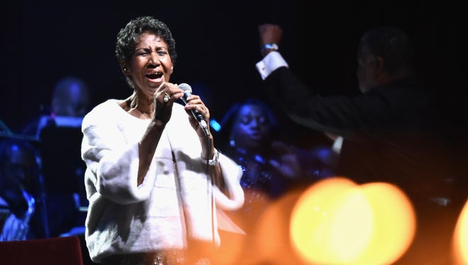 Aretha Franklin performs onstage at the Elton John AIDS Foundation commemorates its 25th year Tuesday at Cathedral of St. John the Divine in New York City.