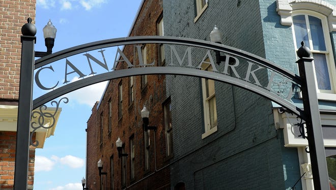 An archway over the walkway between the Courthouse Square and the Canal Market District in downtown Newark, an example of specialized ornamental iron work made by Eagle Machine & Welding
An archway over the walkway between the Court House Square and the Canal Market District in downtown Newark, an example of specialized ornamental iron work made by Eagle Machine & Welding
