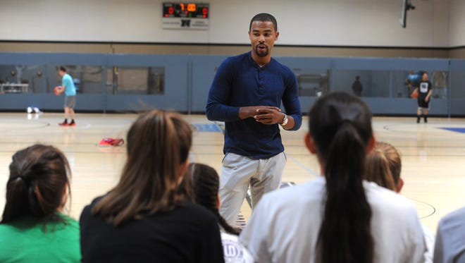 Former Wolf Pack basketball player Ramon Sessions speaks to area students at the South Reno Athletic Club on Wednesday.