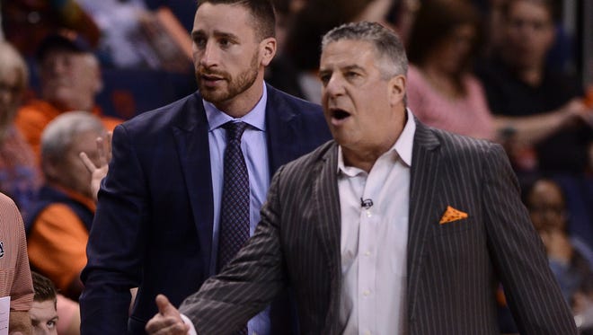 Steven Pearl and Bruce Pearl on the sidelines during an Auburn men's basketball vs Florida on Tuesday, Feb. 14, 2017, in Auburn, Ala. Steven Pearl was promoted by his father Bruce Pearl to a full-time assistant coach position on April 6, 2017.
