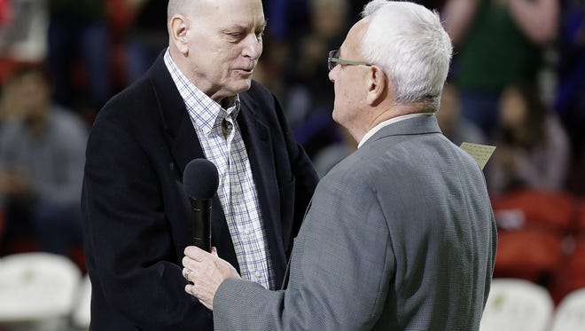 Former UW-Green Bay coaches Dick Bennett, right, and Mike Heideman were honored with Dave Buss at halftime of the Phoenix game against Youngstown State University Saturday, January 27, 2018 at the Resch Center in Ashwaubenon, Wis.