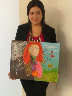 Joseline Valenzuela with her piece "Make the Right Choice."