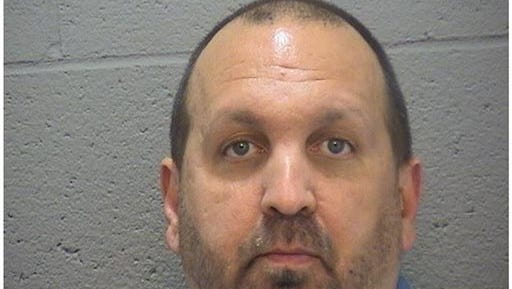 This image provided by the Durham County Sheriff's office shows a booking photo of  Craig Stephen Hicks, 46, who was arrested on three counts of murder early Wednesday Feb. 11, 2015. He is being held at the Durham County Jail. Police were responding to a report of gunshots around 5:15 p.m. Tuesday when they found three people who were pronounced dead at the scene. The dead were identified as Deah Shaddy Barakat, 23, of Chapel Hill; Yusor Mohammad, 21, of Chapel Hill; and Razan Mohammad Abu-Salha, 19, of Raleigh. (AP Photo/Durham County Sheriff)