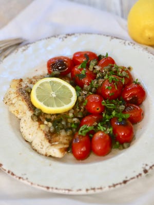 Pan Fried Fish and Blistered Tomatoes  with lemon, butter, parsley sauce.