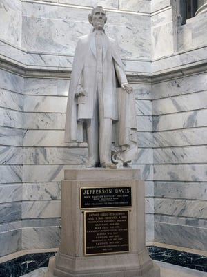 The Jefferson Davis statue in the Kentucky State Capitol rotunda has drawn complaints for many years about its high profile place in what was considered neutral grounds during the Civil War. Aug. 16, 2017