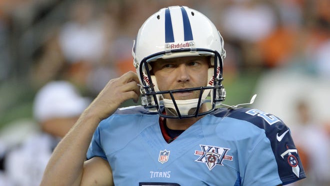 In this Aug. 17, 2013 file photo, Tennessee Titans kicker Rob Bironas walks off the field in the second half of an NFL preseason football game against the Cincinnati Bengals, in Cincinnati.