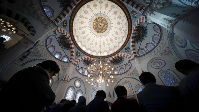 Muslims offer Friday prayers at Tokyo Camii, the largest mosque in Japan, on Jan. 23, 2015.