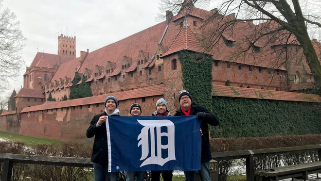 Mark Klein, right, of Allen Park and his sons took the D to Malbork Castle in Malbork, Poland, in February. Built by religious order the Teutonic Knights in the 13th Century, it is the largest castle in the world measured by land area. Accompanying their father were, from left,  Chris Klein of Las Vegas, Nick Klein of Allen Park and Kevin Kline of Krakow, Poland.