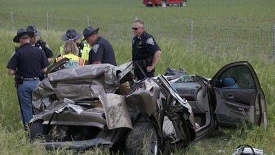 Authorities at the scene of a June 2014 crash on Interstate 69 in southwestern Delaware County that claimed the life of a 4-year-old girl.