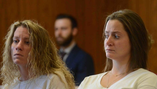 Former Paramus Catholic guidance counselor Kate Drumgoole, left, seen here with her partner, Jaclyn Vanore, during a hearing on her lawsuit against Paramus Catholic H.S. and the Archdiocese of Newark.