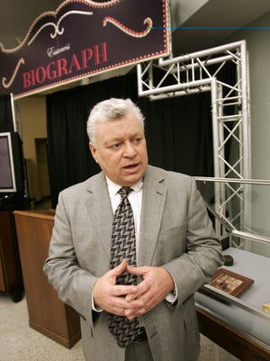 Jeff Scalf, great nephew of the infamous John Dillinger, speaks near Dillinger memorabilia at an exhibit at the Indiana State Museum in 2009.  On the 75th anniversary of Dillinger's death, the family announced a plan to start the John Dillinger Troubled Youth Fund which aims to help troubled kids around the country.  The family started the fund with $7007.71, the $7.71 indicating what was found in Dillinger's pocket when he was killed by FBI agents.