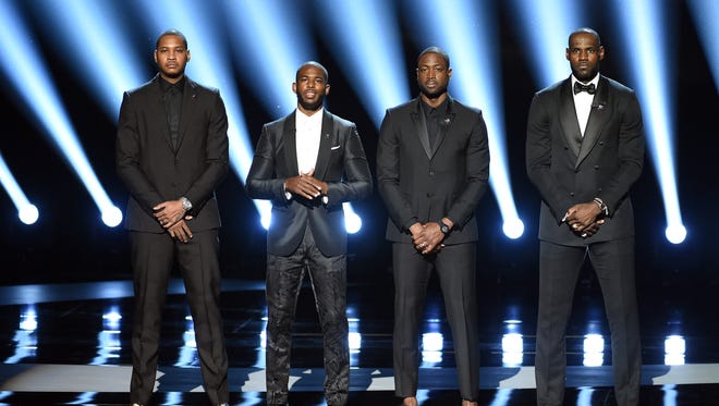 (L-R) NBA players Carmelo Anthony, Chris Paul, Dwyane Wade and LeBron James speak onstage during the 2016 ESPYS at Microsoft Theater on July 13, 2016 in Los Angeles.