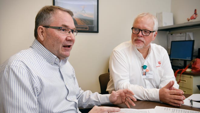 Joel Vogel and Pete Olson talk about the Mended Hearts volunteer program Monday, Dec. 19, at the St. Cloud Hospital. Mended Hearts connects past and present heart patients to create a network of support and hope.