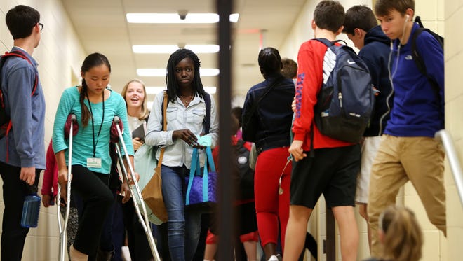 Students fill the halls in between classes at Walnut Hills High School.