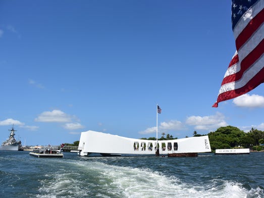 Looking back at the USS Arizona Memorial, and the USS