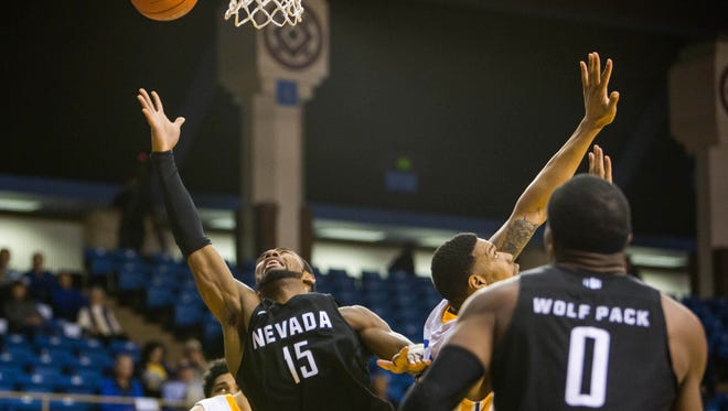 Wolf Pack guard D.J. Fenner attempts a layup during Nevada's game at San Jose State last season, which the Wolf Pack won with a late rally.