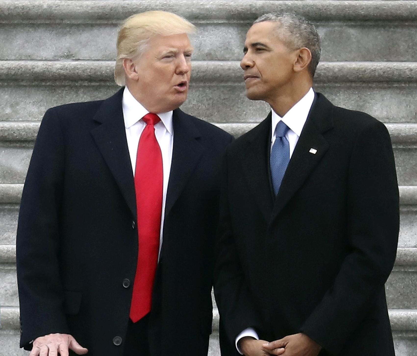 President Donald Trump talks with former President Barack Obama on Capitol Hill last January. Most analysts agree that Trump inherited a solid economy from Obama.