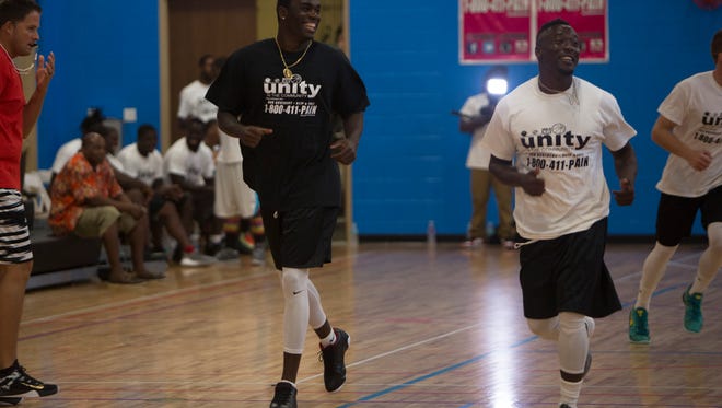 Minnesota Vikings teammates Jayron Kearse, left, and Mackensie Alexander laugh while playing in the 2nd Annual All-Star Basketball Game at the Greater Naples Y.M.C.A. on July 23, 2016 in Naples, Florida. The benefit game included two teams with local NFL players Mackensie Alexander, Jayron Kearse, and Makinton Dorleant on two teams titled Team Lee County and Team Collier County. 
