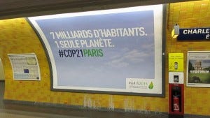 COP 21 sign in Paris subway, “Seven billion inhabitants. One single planet.” “Milliard” means a thousand millions (a billion) in English.]
