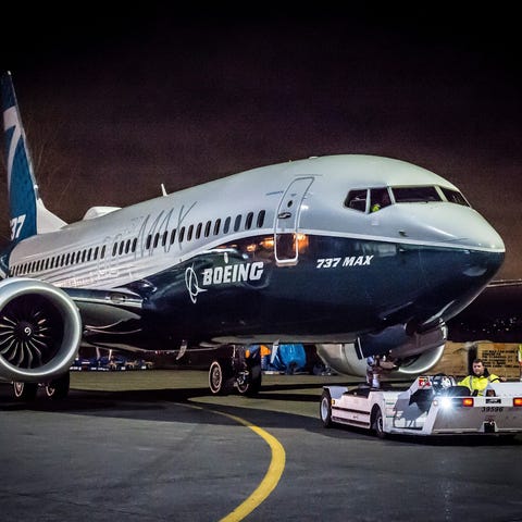 A Boeing 737 Max on a tow.