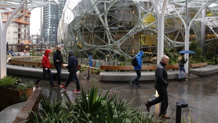 People take a tour during the grand opening of...
