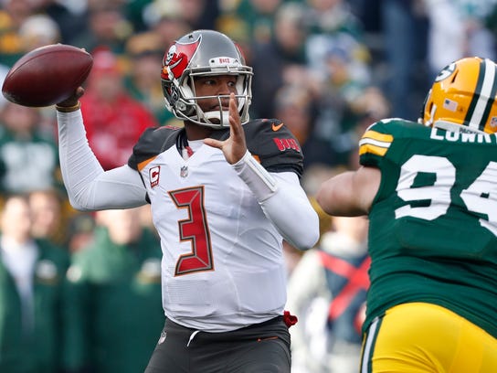 Tampa Bay Buccaneers' Jameis Winston throws during the first half of an NFL football game against the Green Bay Packers Sunday, Dec. 3, 2017, in Green Bay, Wis. (AP Photo/Matt Ludtke)