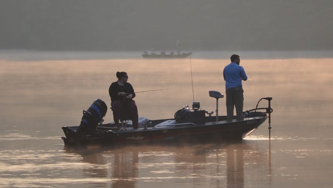 Anglers enjoy a day of fishing on their favorite lake. Bass season in Pennsylvania begins June 18.