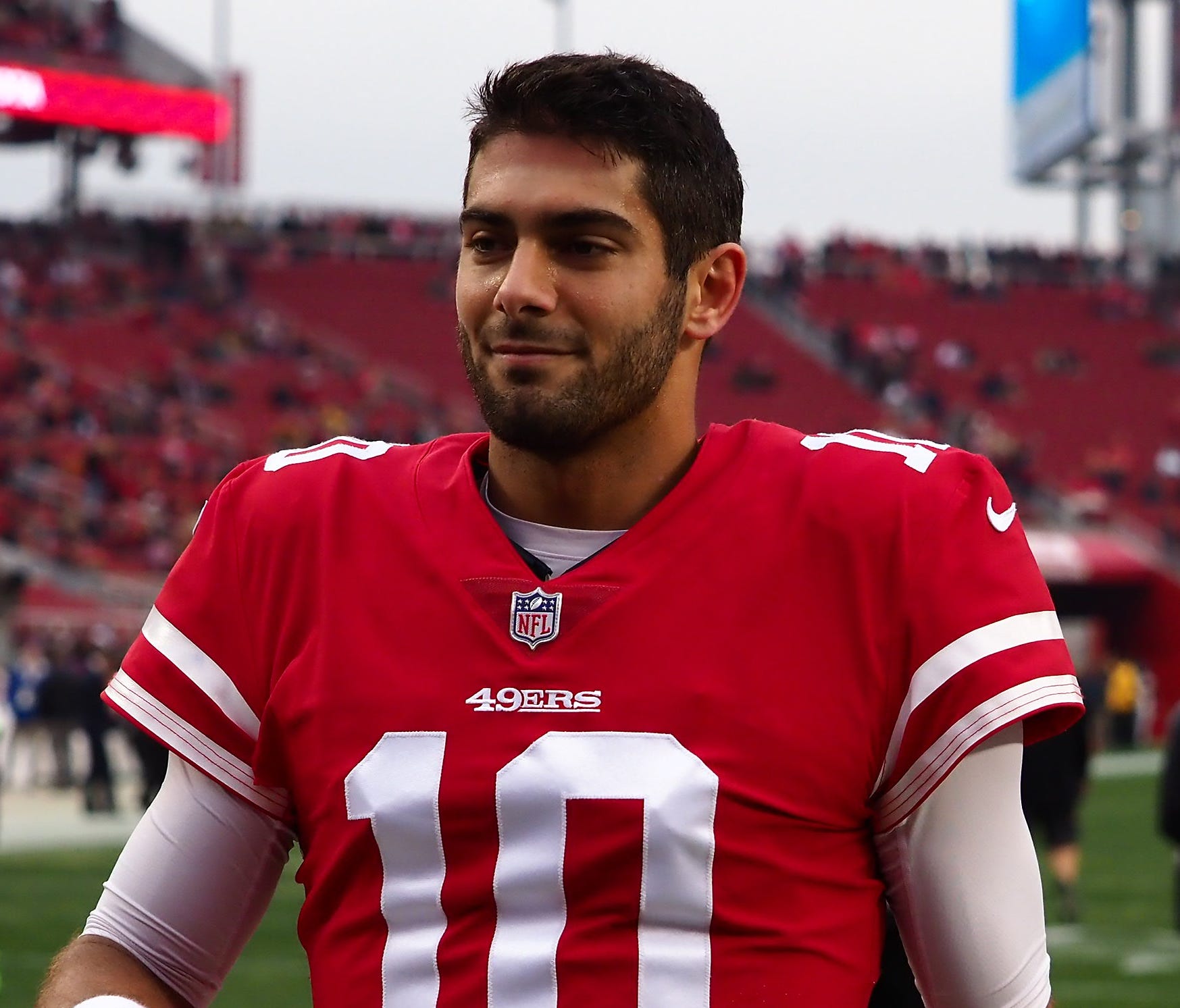 San Francisco 49ers quarterback Jimmy Garoppolo (10) walks to the sideline before a game against the Jacksonville Jaguars at Levi's Stadium.