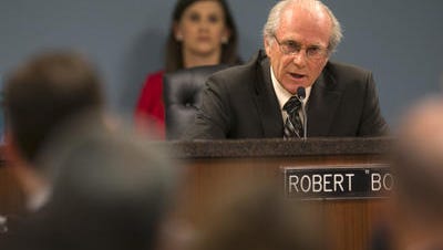 Commissioner Bob Burns will get legal help now that APS has sued to stop his investigation.