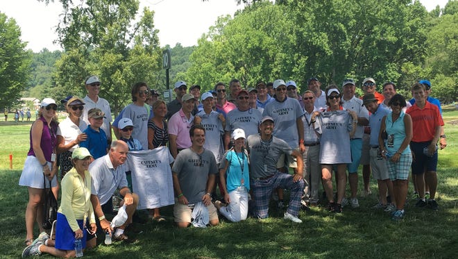Thomas Pablo (center with plaid pants) originated Gaffney's Army last year at Whistling Straits and was back Thursday at Baltusrol with t-shirts for the nearly 40 friends and family members that came to watch the Quaker Ridge head professional compete in the 98th PGA Championship.