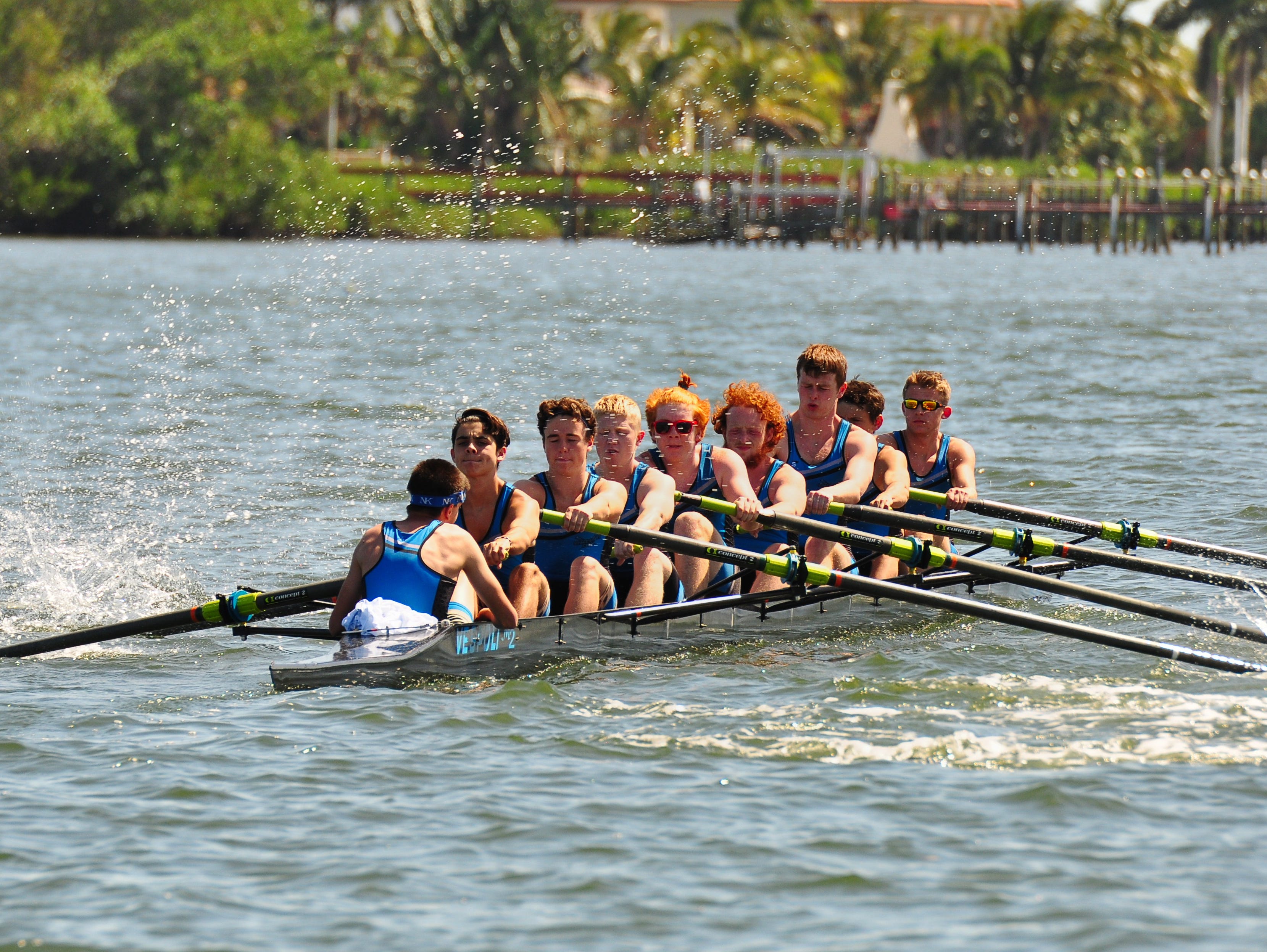 Space Coast Crew competes on the Banana River, just north of Mathers Bridge. Photo by Paul Markum.