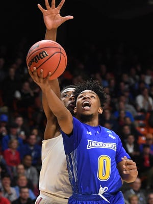 Mar 15, 2018; Boise, ID, USA; Ohio State Buckeyes forward Andre Wesson (24) defends South Dakota State Jackrabbits guard Brandon Key (0) on a shot in the second half during the first round of the 2018 NCAA Tournament at Taco Bell Arena. Mandatory Credit: Kyle Terada-USA TODAY Sports