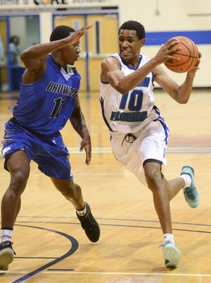 Eastern Florida State College's CJ Jackson drives to the basket during a game in 2016. Jackson is now playing with Big X in The Basketball Tournament in Columbus, Ohio.