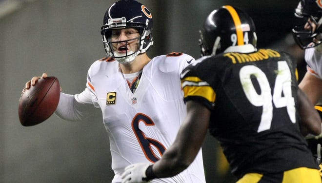 Chicago Bears quarterback Jay Cutler (6) throws a pass in front of Pittsburgh Steelers linebacker Lawrence Timmons (94) during the second half at Heinz Field.