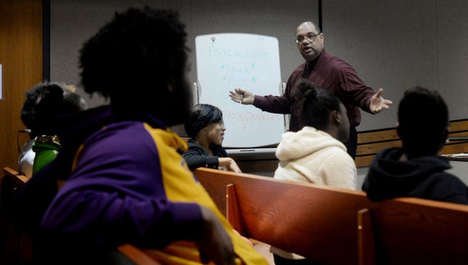 Wayne Bryant teaches a life skills class at the Shreveport City Court Tuesday evening.