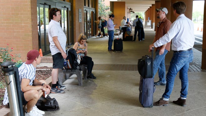 Passengers wait at Tallahassee International Airport.