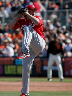 Cincinnati Reds pitcher Sal Romano (47) winds up before a pitch in the bottom of the third inning.