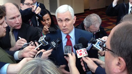 Reporters interview Indiana Gov. Mike Pence
