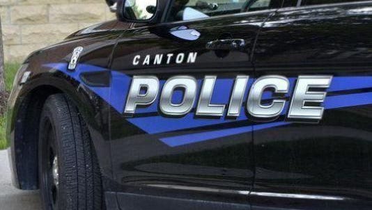 Canton Police are investigating a young woman's claims that her father threatened her with a gun.