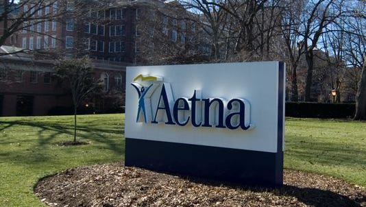 A sign for Aetna insurance is seen in Hartford, Conn.